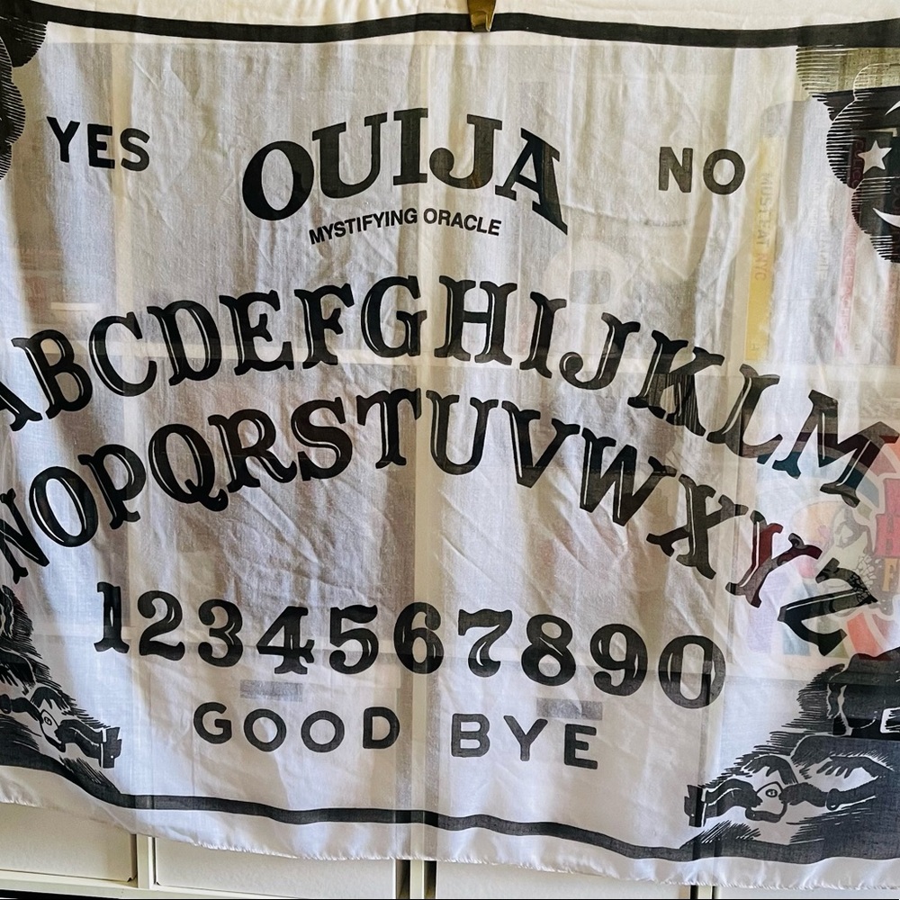 Ouija board scarf, wall hanging or for a Halloween costume. Used as is.